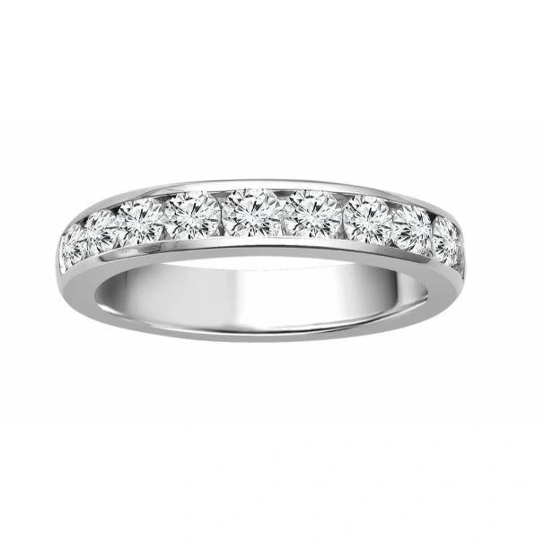 Elegant 14kt white gold wedding band featuring a full carat of channel-set, G/H color, SI clarity sparkling diamonds.