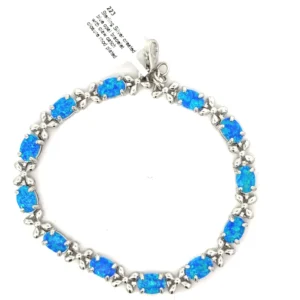 "Elegant sterling silver bracelet featuring enchanting blue opal and dazzling cubic zirconia dangles with secure fish hook closures."