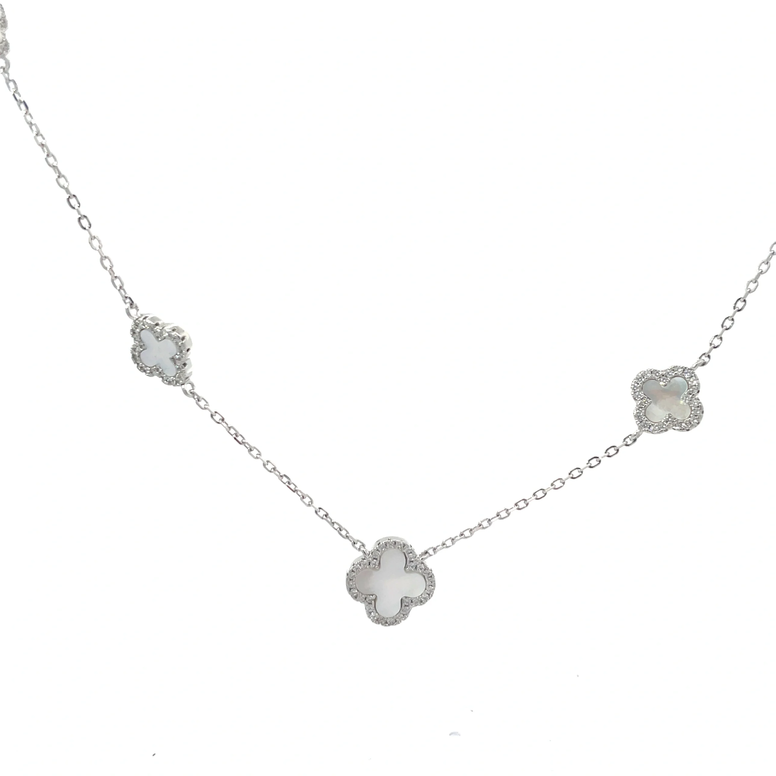 Elegant rhodium plated Sterling Silver necklace featuring lovely mother of pearl clover and sparkling cz on an adjustable chain.