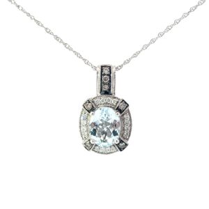 14kt wg aquamarine and diamond pendant 1 oval aquamarine 1.75ct 7 rd chocolate diamonds .33 PTS