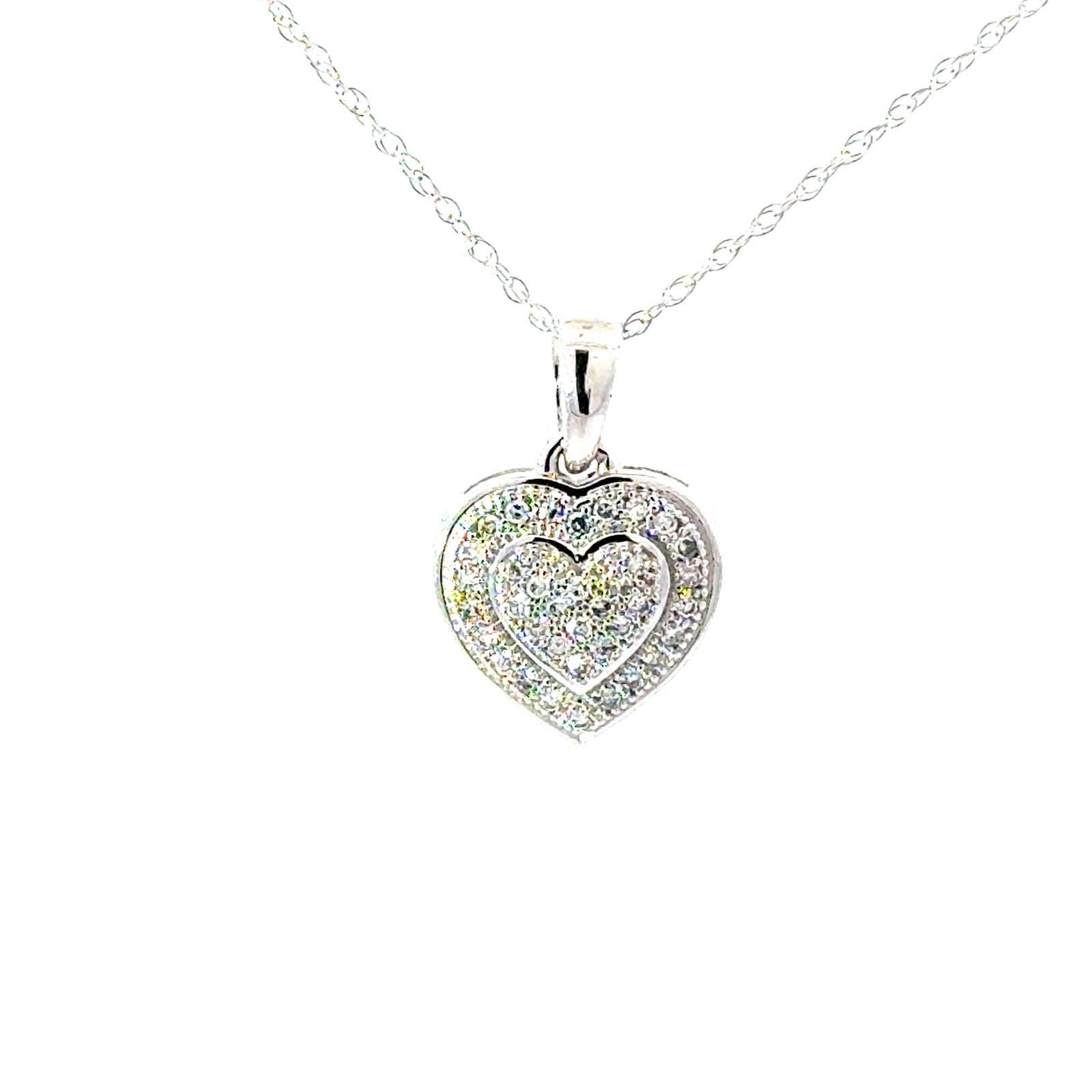 10kt white gold diamond heart pendant on 18" machine made rope tw 0.10cts SI, H/I
