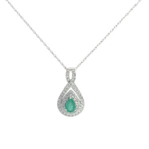 14kt white gold diamond and emerald pendant on machine made rope 18" tw D 0.33cts E tw 0.40cts