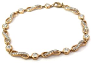 10kt two tone diamond infinity illusion bracelet with claw catch tw 0.50cts SI, near colorless H/I