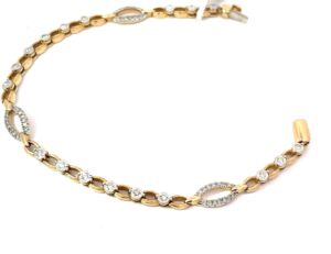 10kt two tone diaond oval tennis bracelet with illusion heads tw 0.50cts SI2/I1 I/J