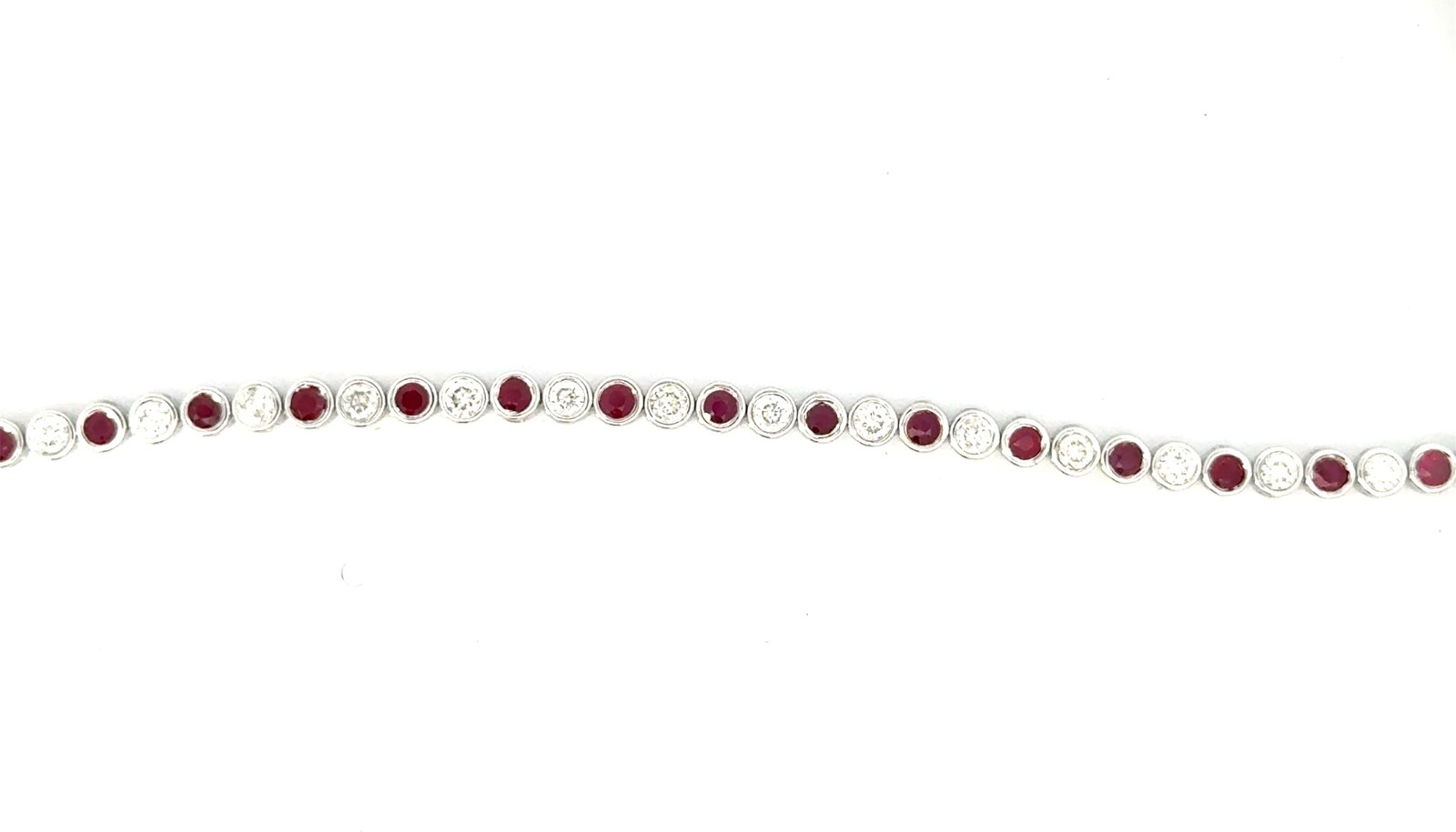 .jpg 10kt white gold diamond and ruby tennis bracelet D tw 1.09cts R tw 1.26cts SI, near colorless H/I color