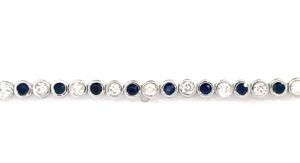 10kt white gold sapphire and diamond bezel tennis bracelet 1.09cts SI clarity, near colorless H/I color S tw1.60