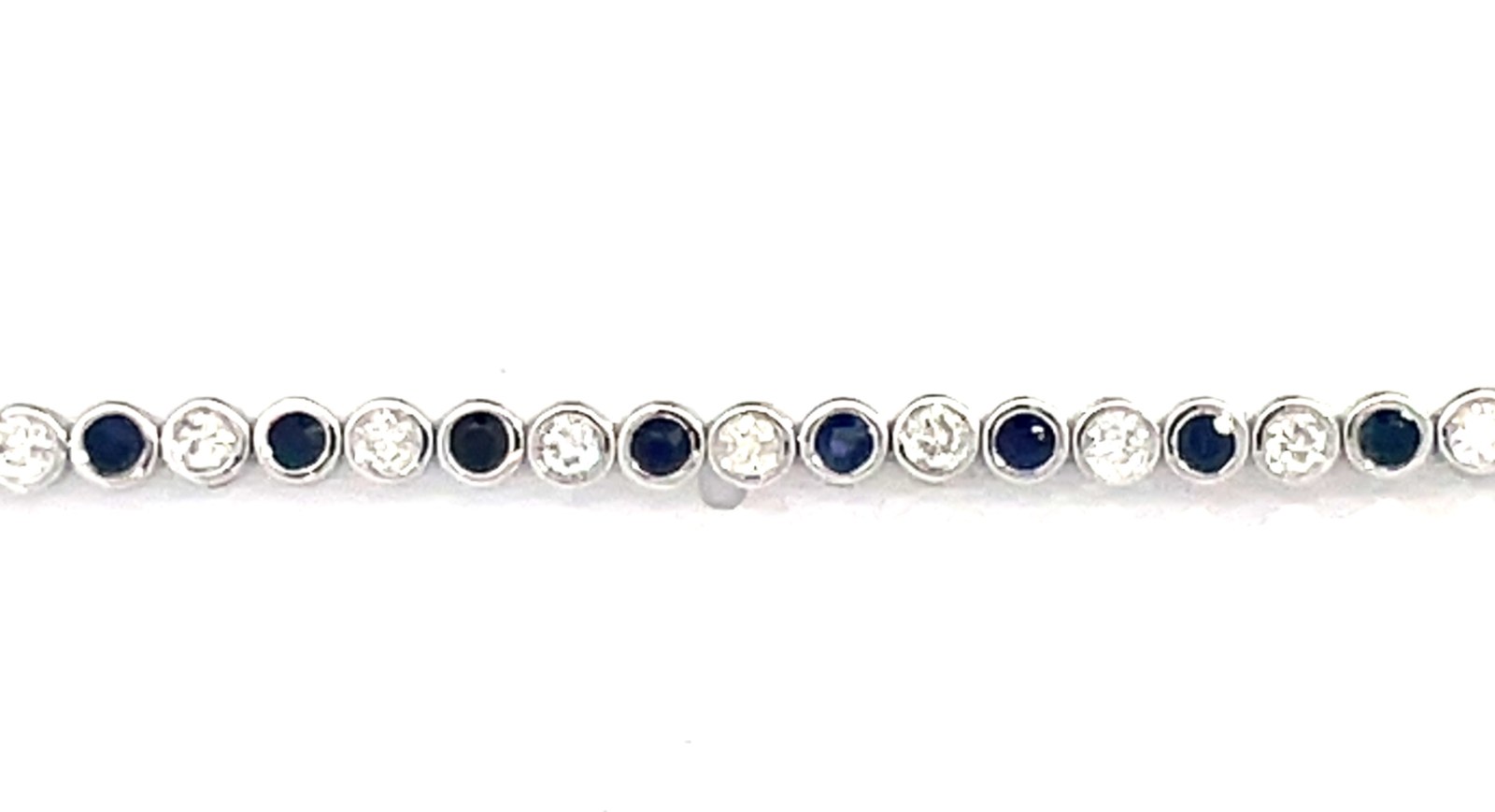 .jpg 10kt white gold sapphire and diamond bezel tennis bracelet 1.09cts SI clarity, near colorless H/I color S tw1.60