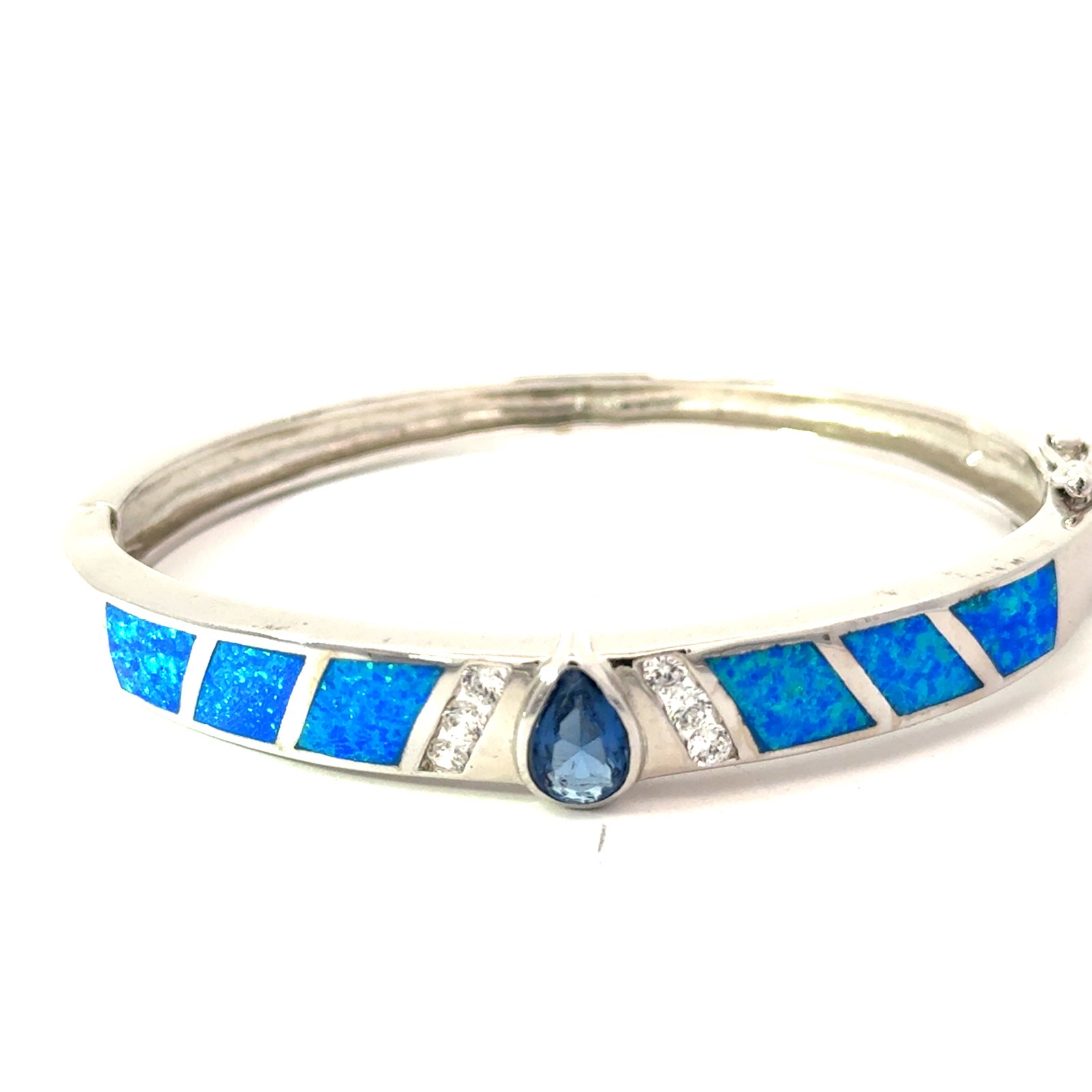 Sterling Silver rhodium plated created blue opal inlay and cz bangle bracelet with foldover safty