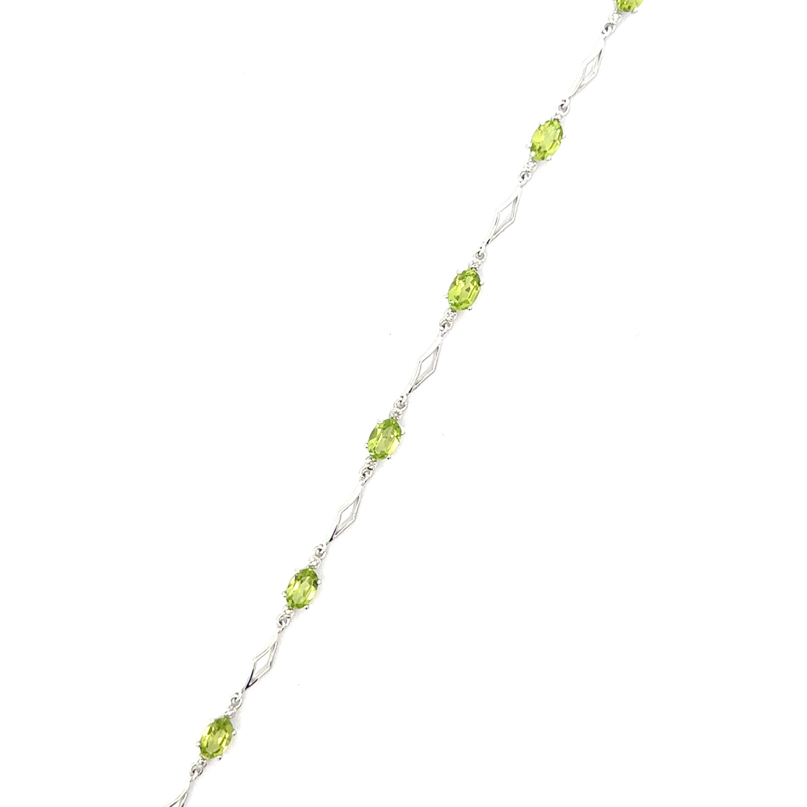 .jpg 10kt white gold genuine peridot and diamond open link bracelet with claw catch closure