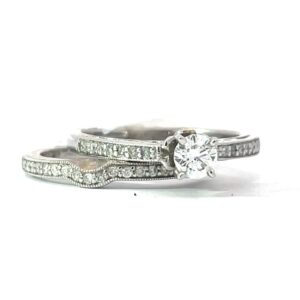 14kt w/g dia eng ring w/matching dia band. C dia 4.0mm 16 dia eng ring, 17 dia in wedding band tw 0.50 cts