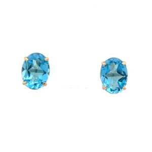 14kt yellow gold blue topaz 8 by 6 oval stud earring