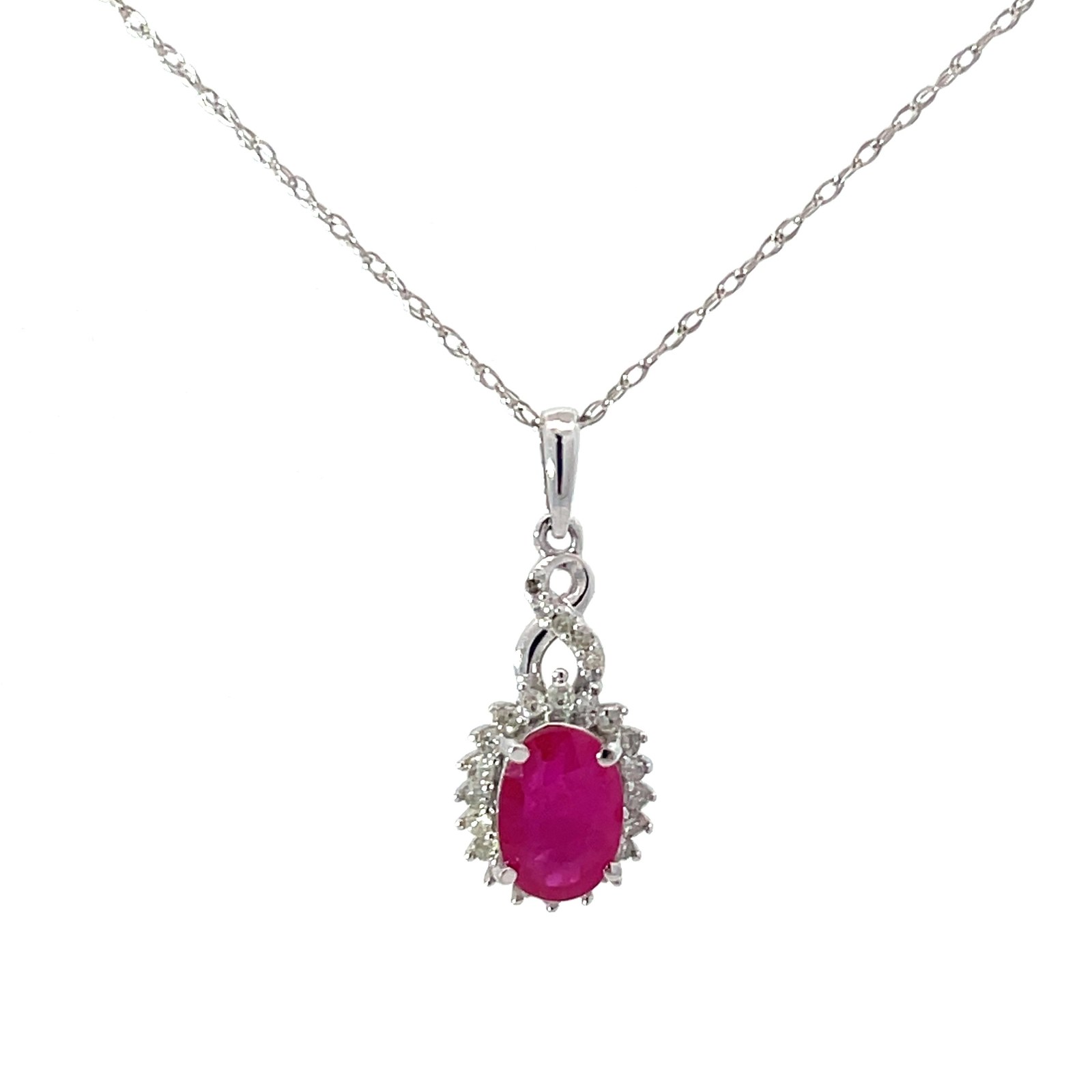 10kt white gold diamond and ruby halo pendant D tw 0.15cts on machine made rope 18" I1,I