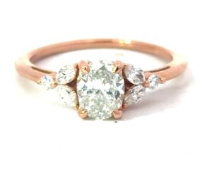 14kt rose gold diamond engagement ring Center Oval 1.00cts tw 1.25cts