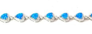 Sterling Silver rhodium plated created blue opal inlay heart and cubic zirconia halo bracleet with claw catch closure
