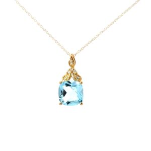 10kt yellow gold genuine blue topaz and diamond cushion shape pendant D tw 0.06cts SI clarity, near colorless H color