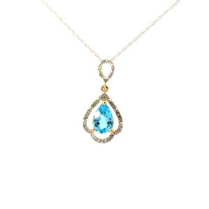 10kt yellow gold blue topaz and diamond open pear shape halo pendant D tw 0.15cts SI clarity, near colorless H/I color on 18" machine made rope