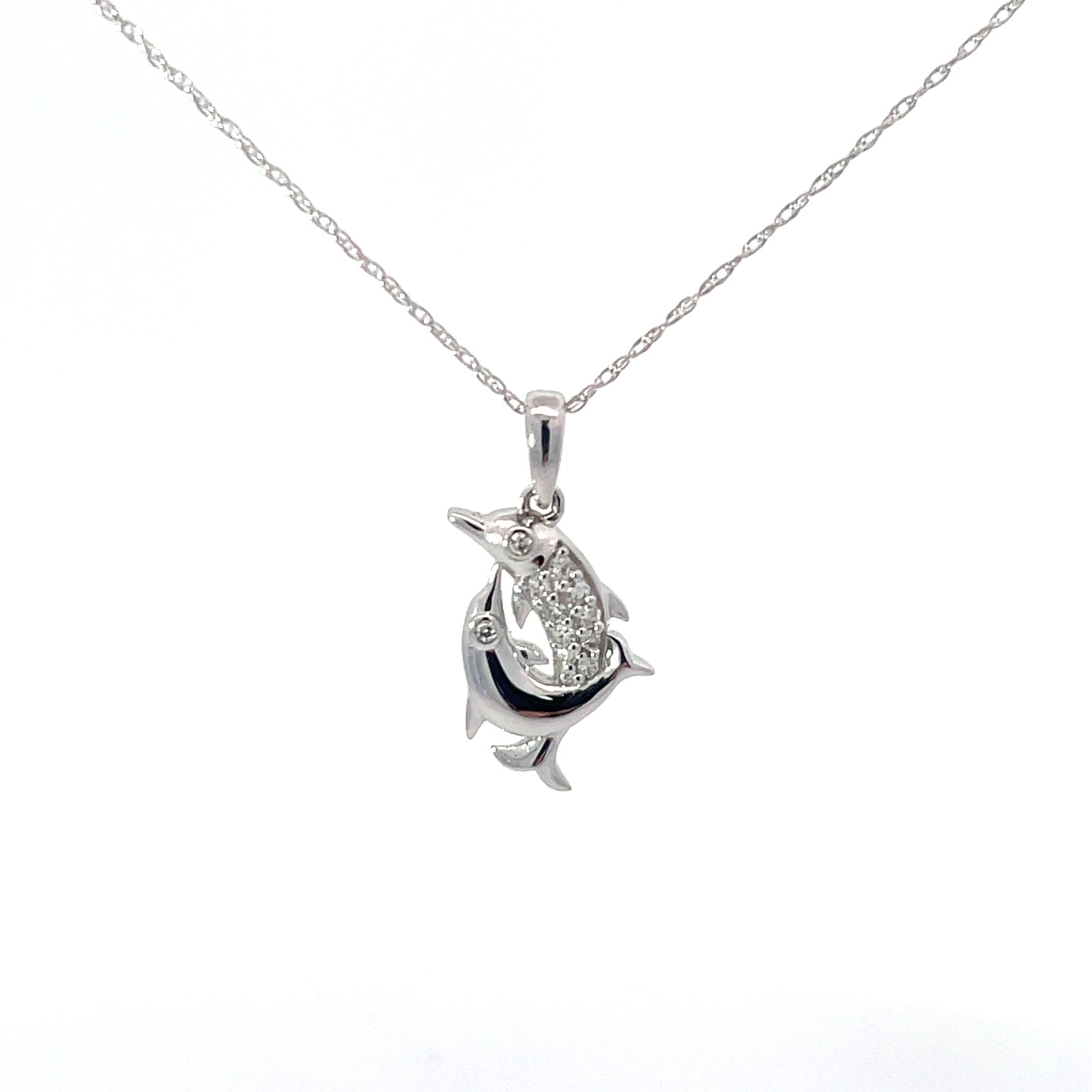 .jpg 10kt white gold double shiny and diamond dolphin pendant on machine rope 18" D tw 0.08cts