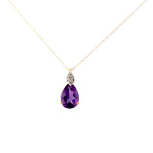 10kt yellow gold diamond and amethyst pear shape pendant SI2 clarity, near colorless I color on machine made rope 18"