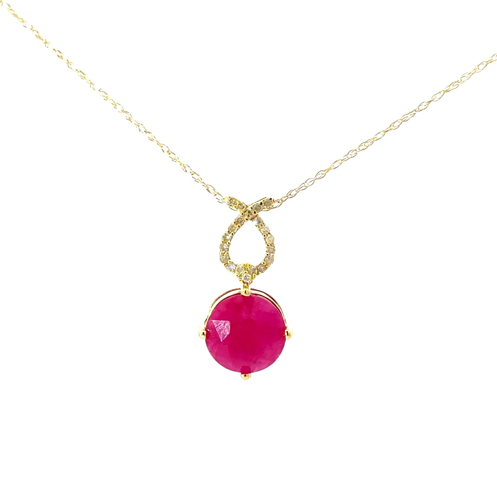 .jpg 10kt yellow gold ruby and diamond pendant D tw 0.10cts I1 clarity, J color on 18" machine made chain