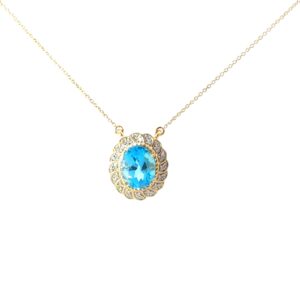 10kt yellow gold blue topaz and diamond halo pendant tw 0.12cts SI clarity, near colorless I color on 18" link chain