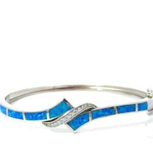 Sterling Silver rhodium plated created blue opal inlay and cubic zirconia bangle bracelet with foldover safety