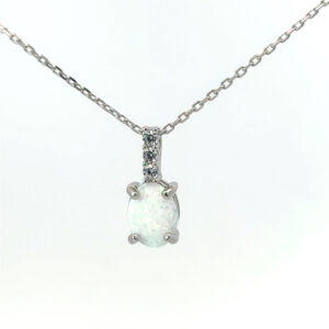 Sterling Silver rhodium plated created white oval opal and cubic zirconia on 1.2mm cable chain 18"