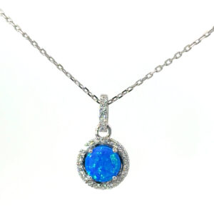 Sterling Silver rhodium plated created blue opal and cubic zirconia round halo pendant on 1.2mm diamond cut cable chain 18"