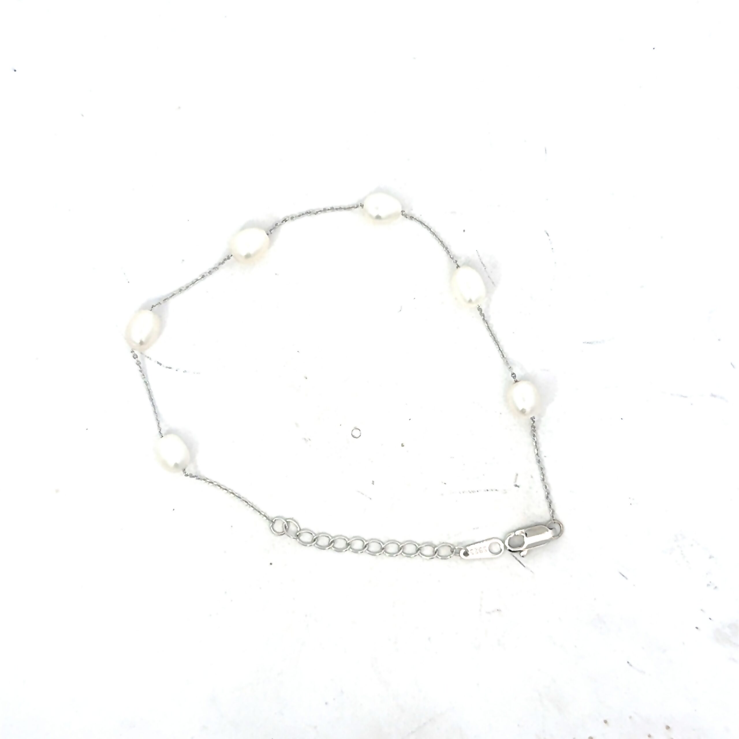 fb scaled .jpg Sterling Silver rhodium plated freshwater pearl pearl by yard bracelet with claw catch closure adjustable