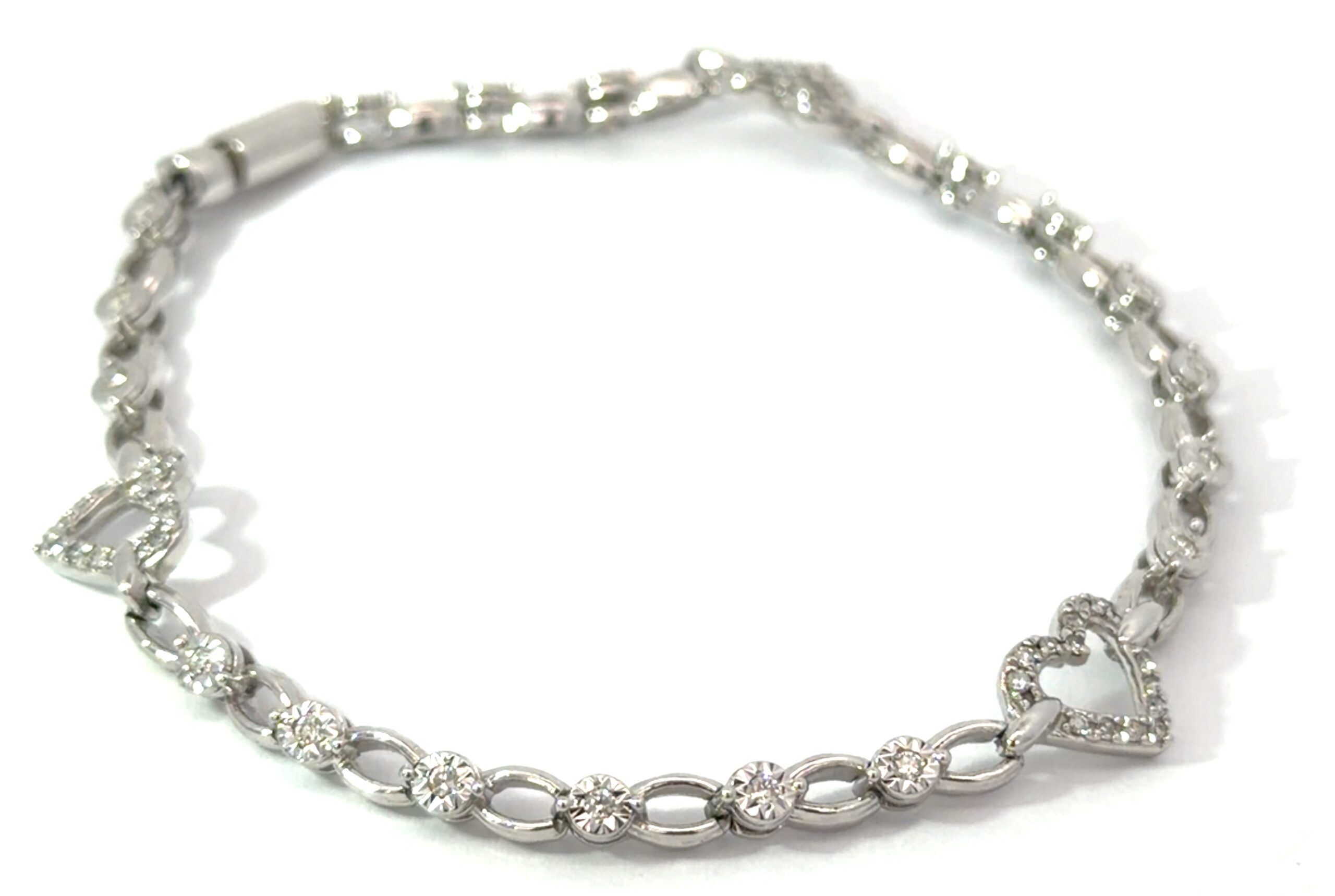 de scaled .jpg 10kt white gold diamond heart bracelet D tw 0.50cts SI2/I1, near colorless I/J color