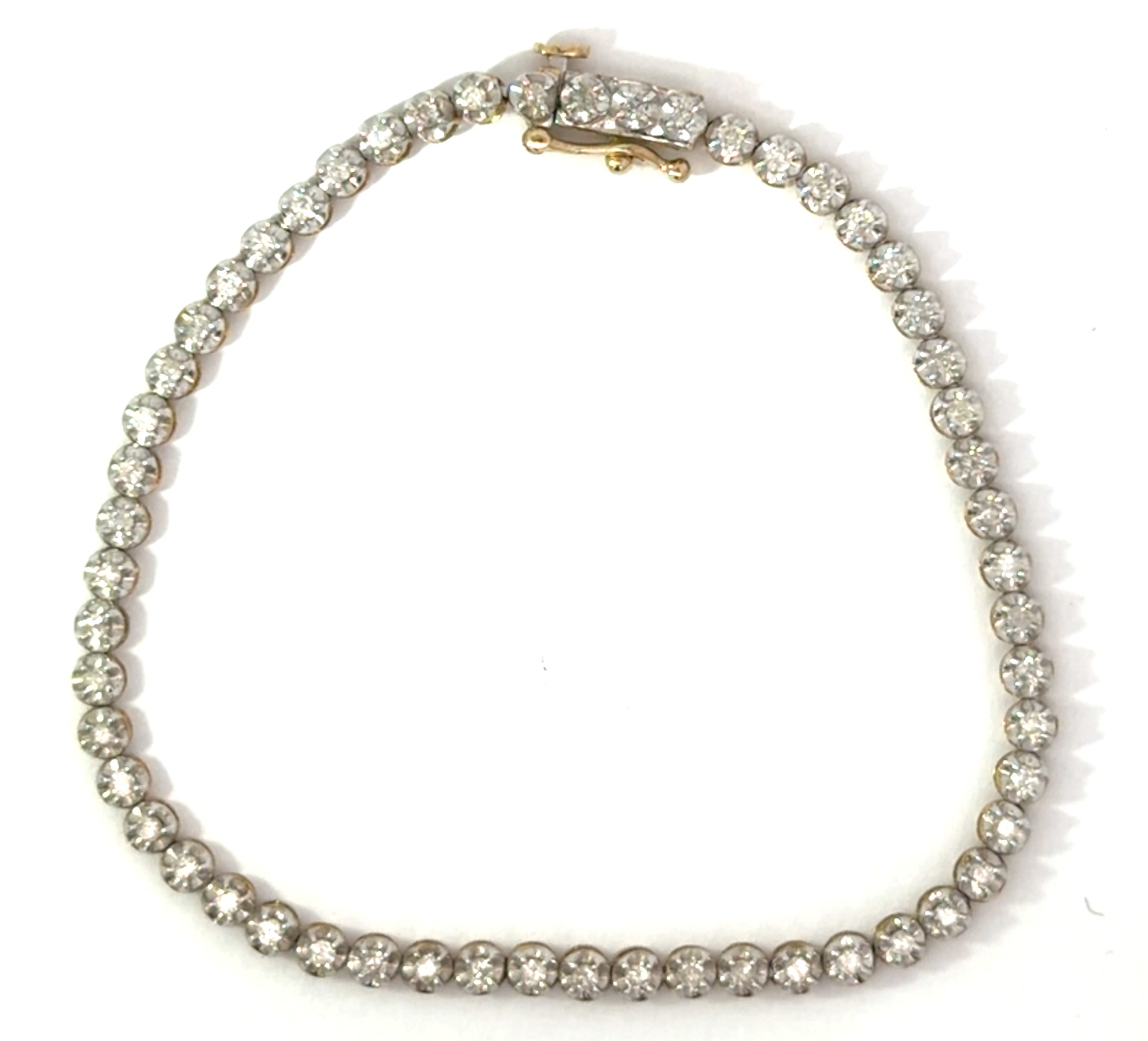 daf .jpg 10kt two tone diamond tennis bracelet D tw 1.05cts SI2, I with safety on side