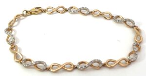10kt yellow gold diamond infinity tennis bracelet tw 0.25cts SI2/I1 clarity, near colorless I/J color