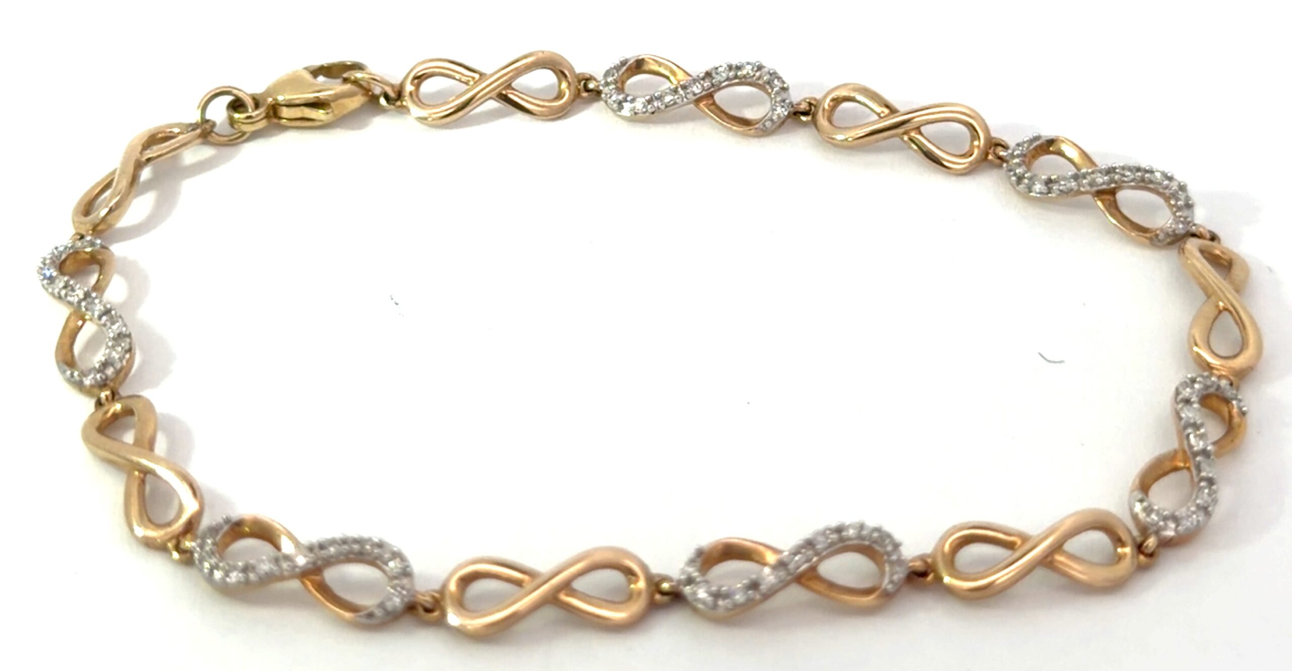 dd scaled .jpg 10kt yellow gold diamond infinity tennis bracelet tw 0.25cts SI2/I1 clarity, near colorless I/J color