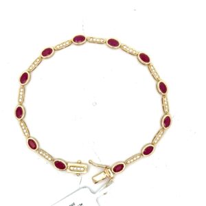14kt yellow gold genuine oval ruby tw 6.15cts and diamond tw 0.85 cts SI1 clarity, near colorless bracelet