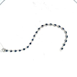 14kt white gold pear shape sappire tw 7.00cts and diamond tw 2.00cts SI1 clarity, near colorless G/H color bracelet