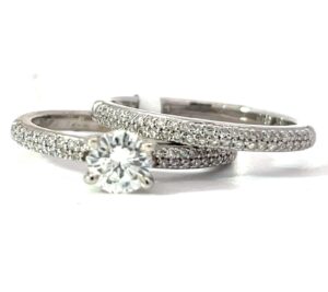 14kt white gold diamond bridal set eng ring c 0.56 cts, tw 0.91 cts SI1, H