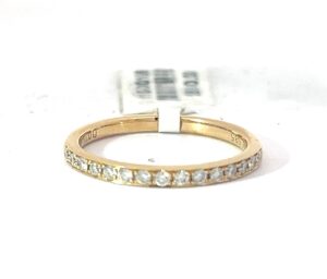 14kt yellow gold diamond wedding band tw 1/4ct SI, G./H shared prong set