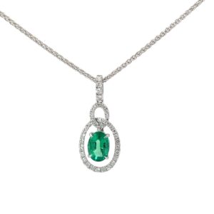18kt white gold diamond and emerald pendant on round wheat chain 18" E tw 0.82cts D tw 1/5ct VS, G