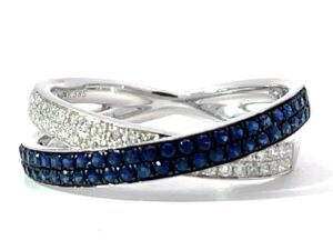 14kt white gold diamond and sapphire cross over ring D tw 1/5ct S tw 3/8ct