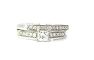 14kt w/g dia bridal set13 dia band, 10 dia eng tw 0.25 pts SI1, g/h center princess tw 0.39 ct tw 0.64 cts