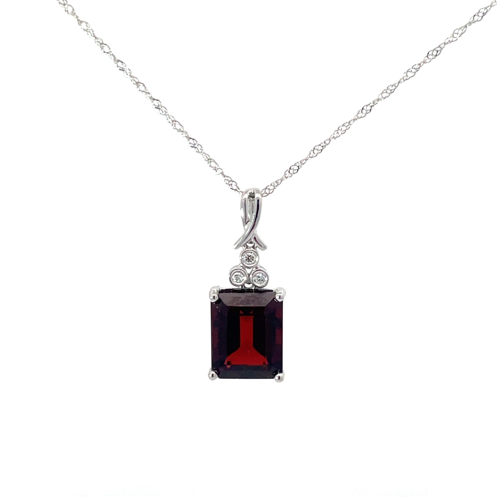 .jpg 14kt white gold diamond and genuine garnet step cut pendant G tw 4.16cts D tw 0.02cts 18" twisted chain