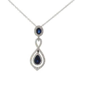 14kt white gold diamond and genuine sapphire twisted double halo pendant D tw 1/5 ct S tw 0.81cts VS2 clarity, near colorless G/H color on 18" link chain