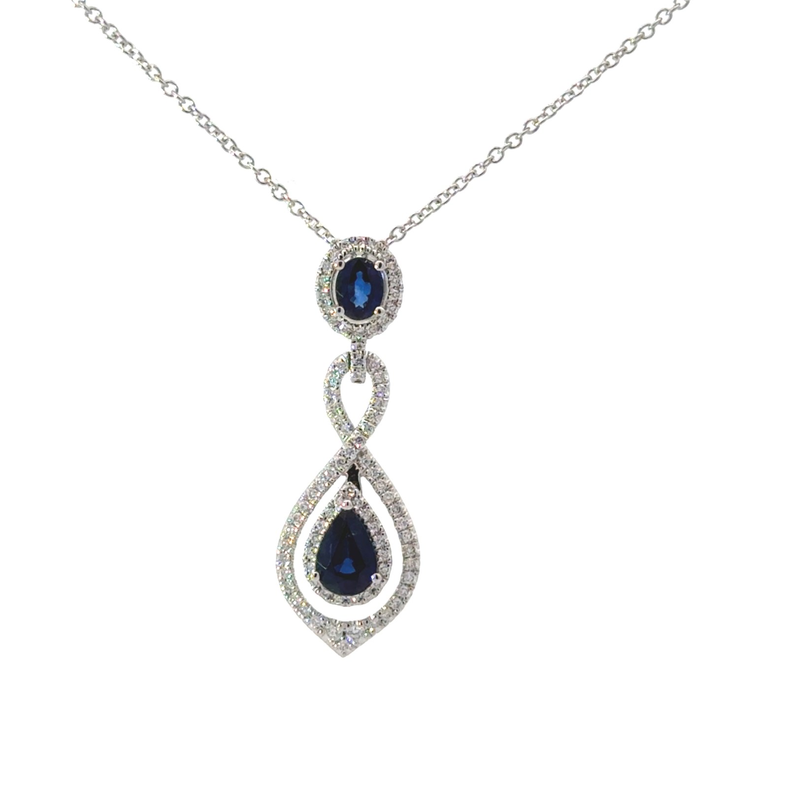 .jpg 14kt white gold diamond and genuine sapphire twisted double halo pendant D tw 1/5 ct S tw 0.81cts VS2 clarity, near colorless G/H color on 18" link chain