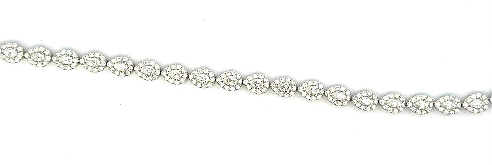 .jpg 18kt white gold diamond pear shape halo tennis bracelet D tw 4.00cts VS2 clarity, colorless F color with hidden catch and two foldover safty