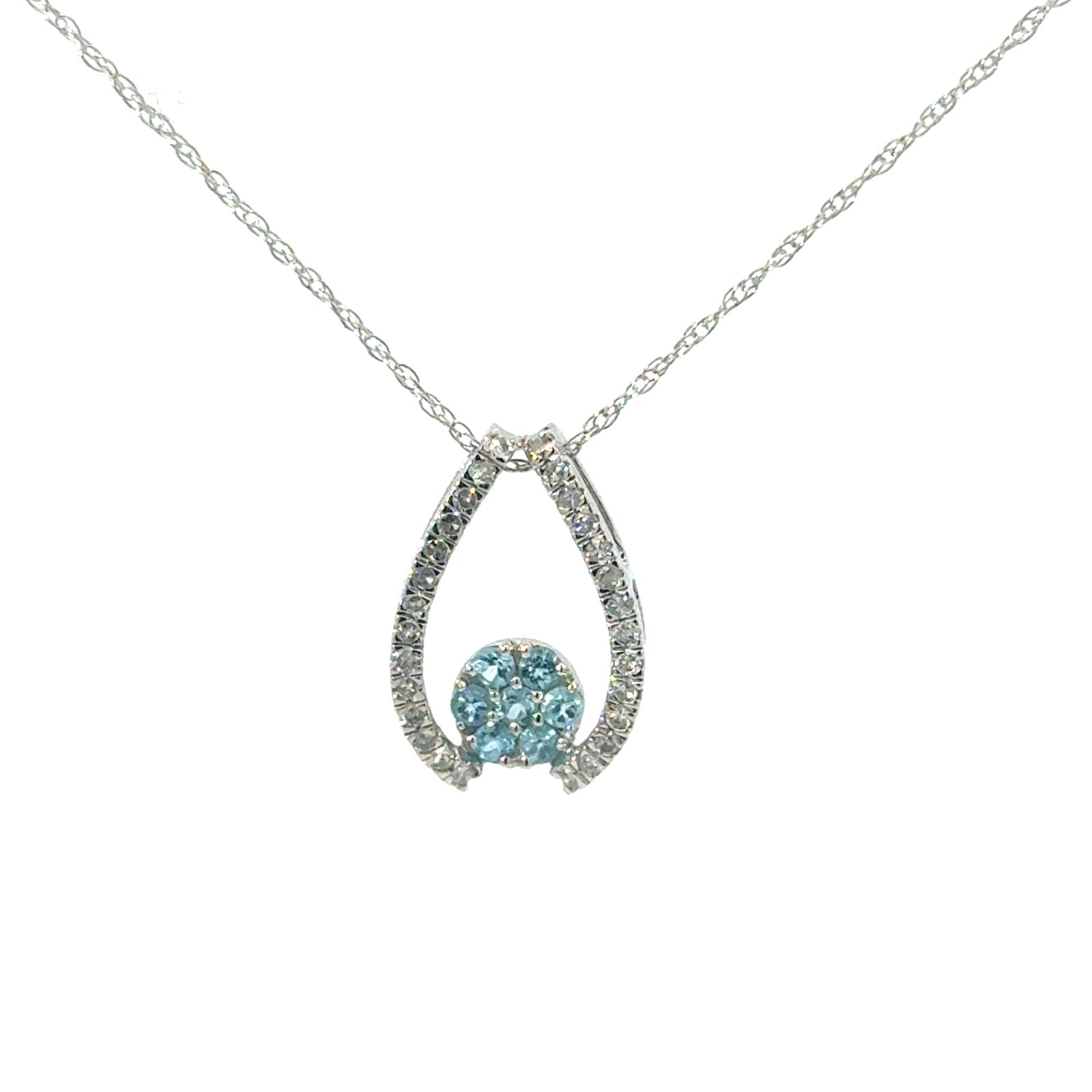 .jpg 10kt white gold diamond and blue topaz cluster pendant D tw 0.15cts on machine made rope chain 18" D tw 0.15cts SI2 clarity, near colorless H color