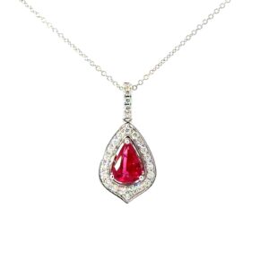 14kt white gold diamond and pear shape genuine ruby halo pendant D tw 0.28cts R tw 1.10cts VS2 clarity, F/G color on 18" link chain
