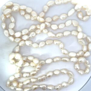 Baroque pearl continuous white strand necklace 64" long 9 by 11mmm