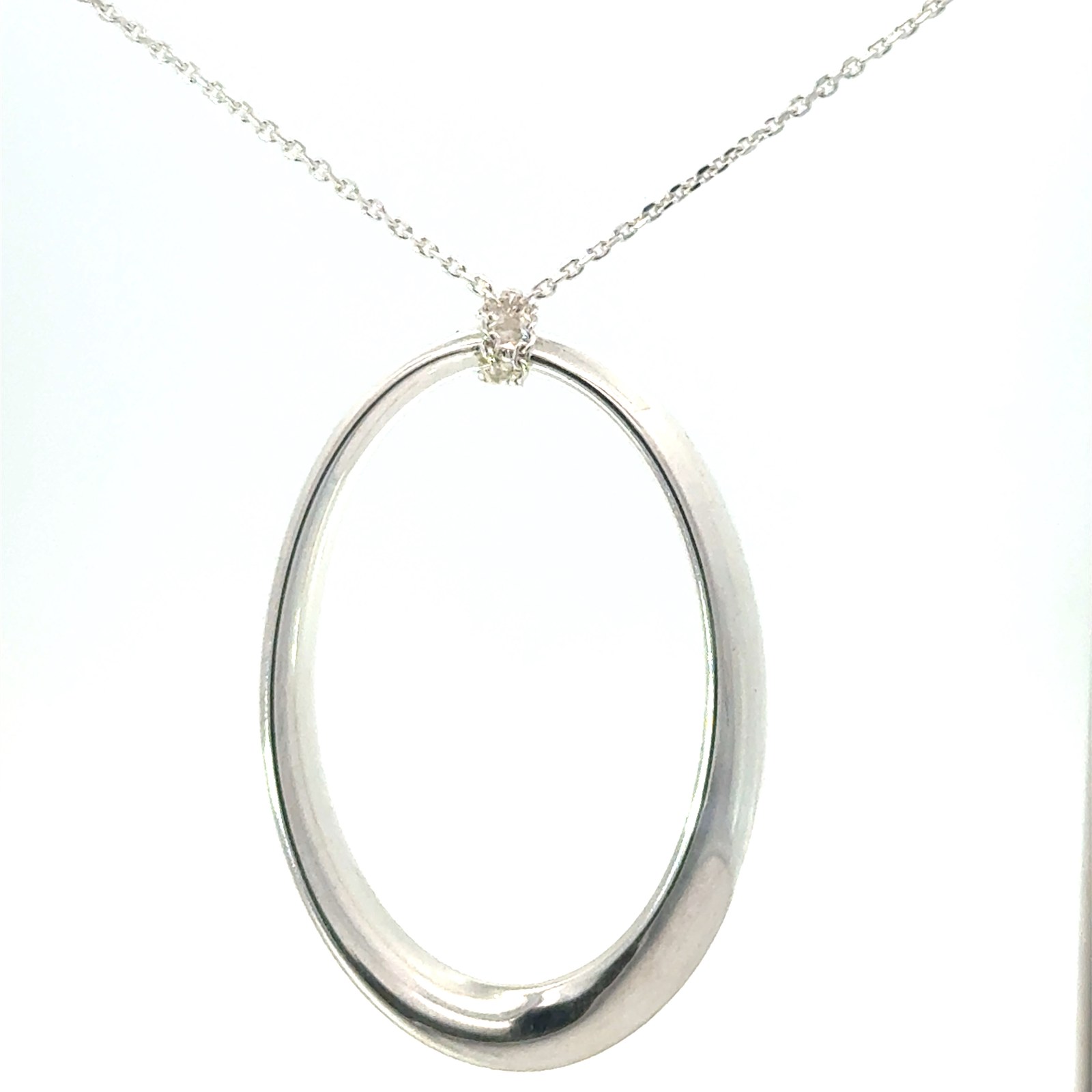Sterling Silver oval necklace on diamond cut cable chain with claw catch closure 18"