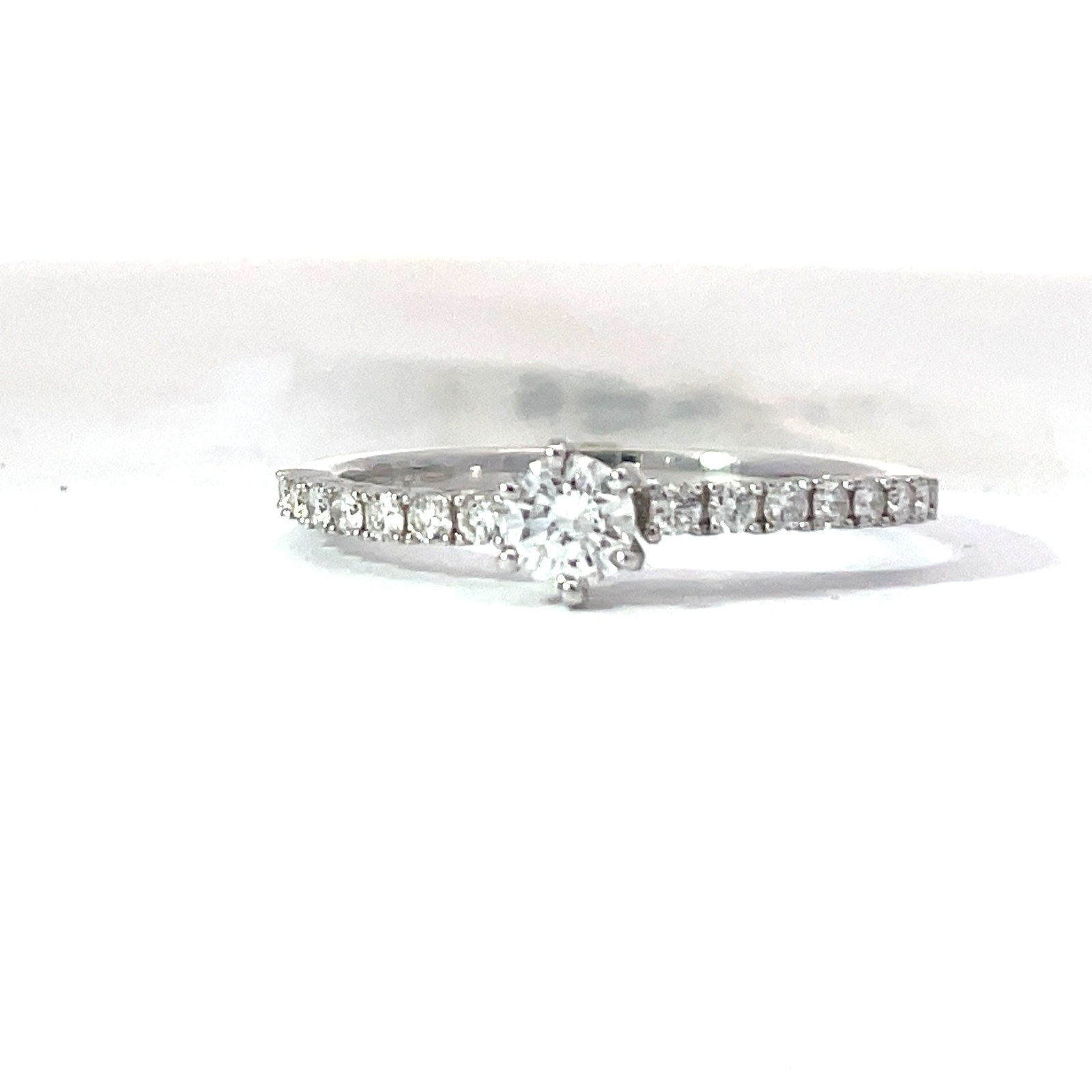 14kt w/g diam eng ring tw 0.42 cts 14 rd dia 0.19 pts, Center tw 0.23 cts VS clarity G/H color