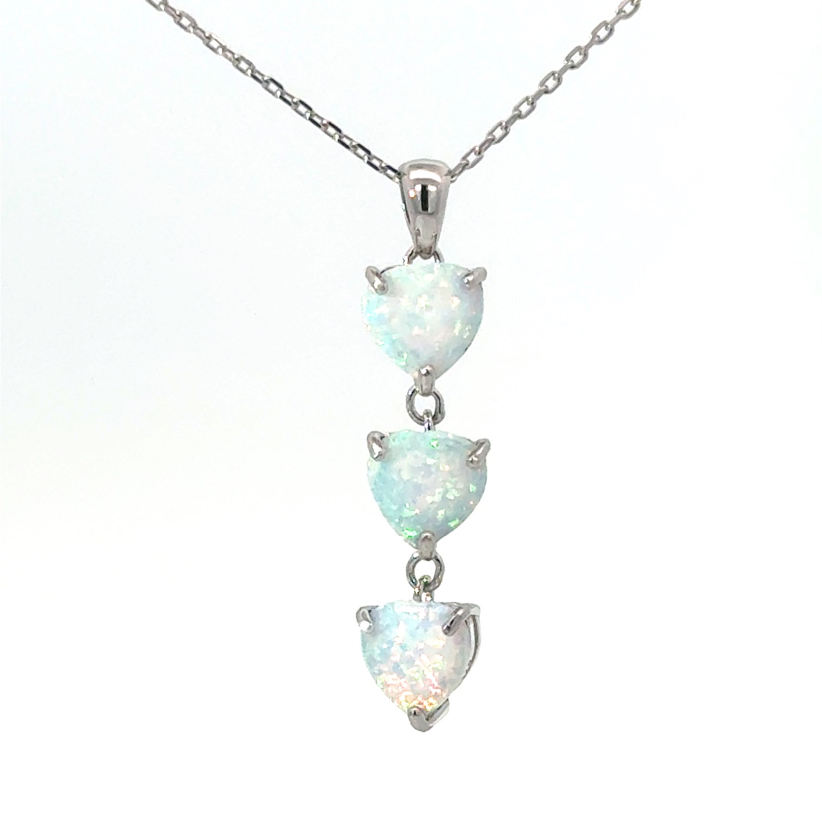 Sterling Silver rhodium plated created white opal tripple heart pendant on diamond cut cable chain 18"