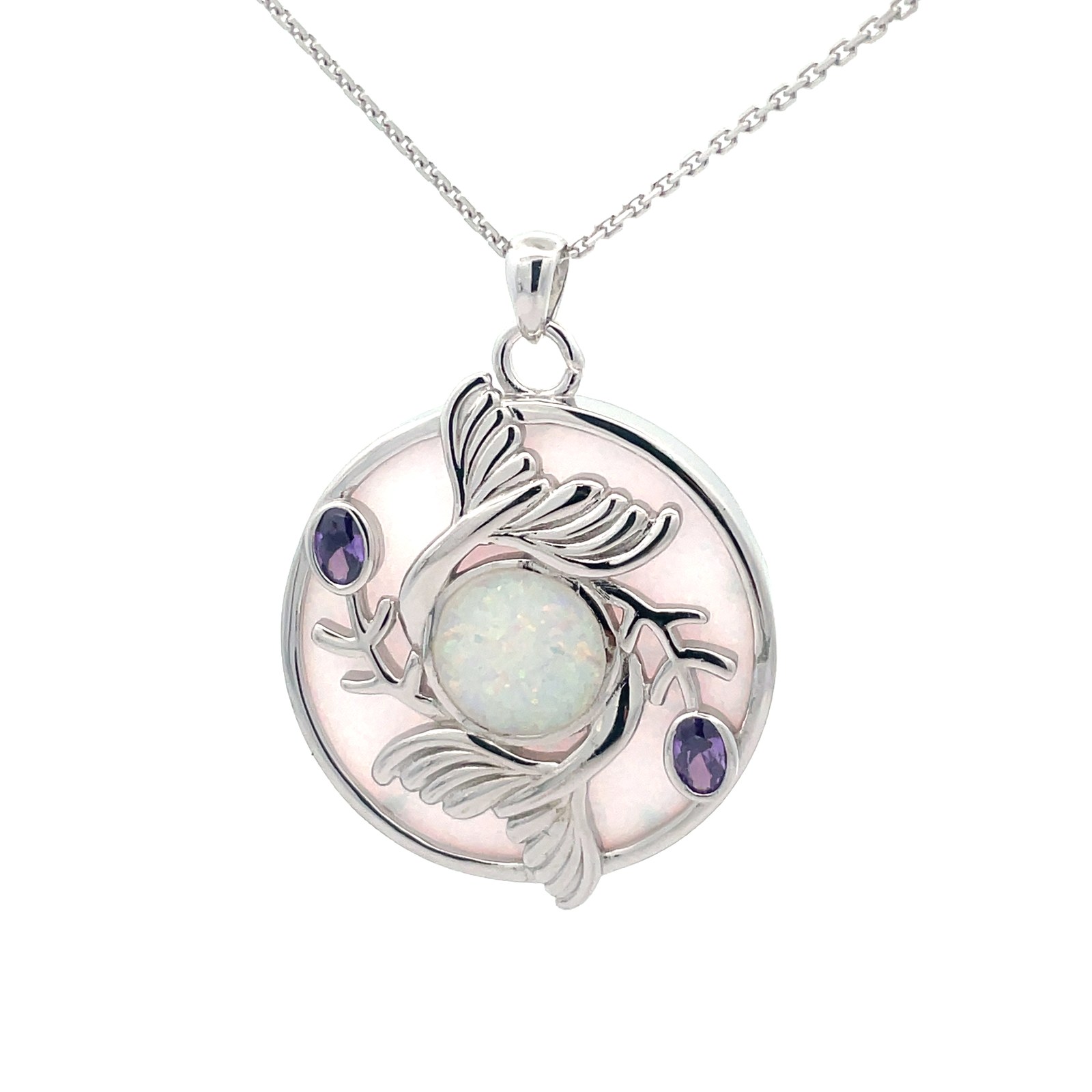 .jpg Sterling silver created white opal inlay in a circle disc with purple cubic zirconia and dolphin tails on 18" cable chain